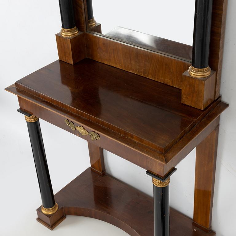 An Empire Mahogany Veneer Mirror and Console Table, first half of the 19th Century.