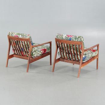 a pair of "USA 75" longe chairs, designed in 1963.