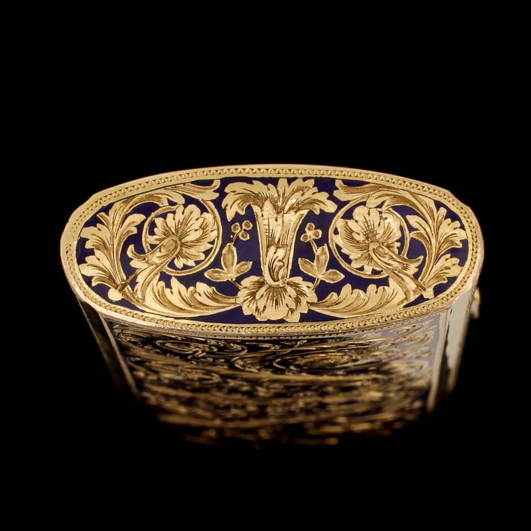 DOSA, 18k guld med blå emalj. 1900-tal. Vikt ca100g.