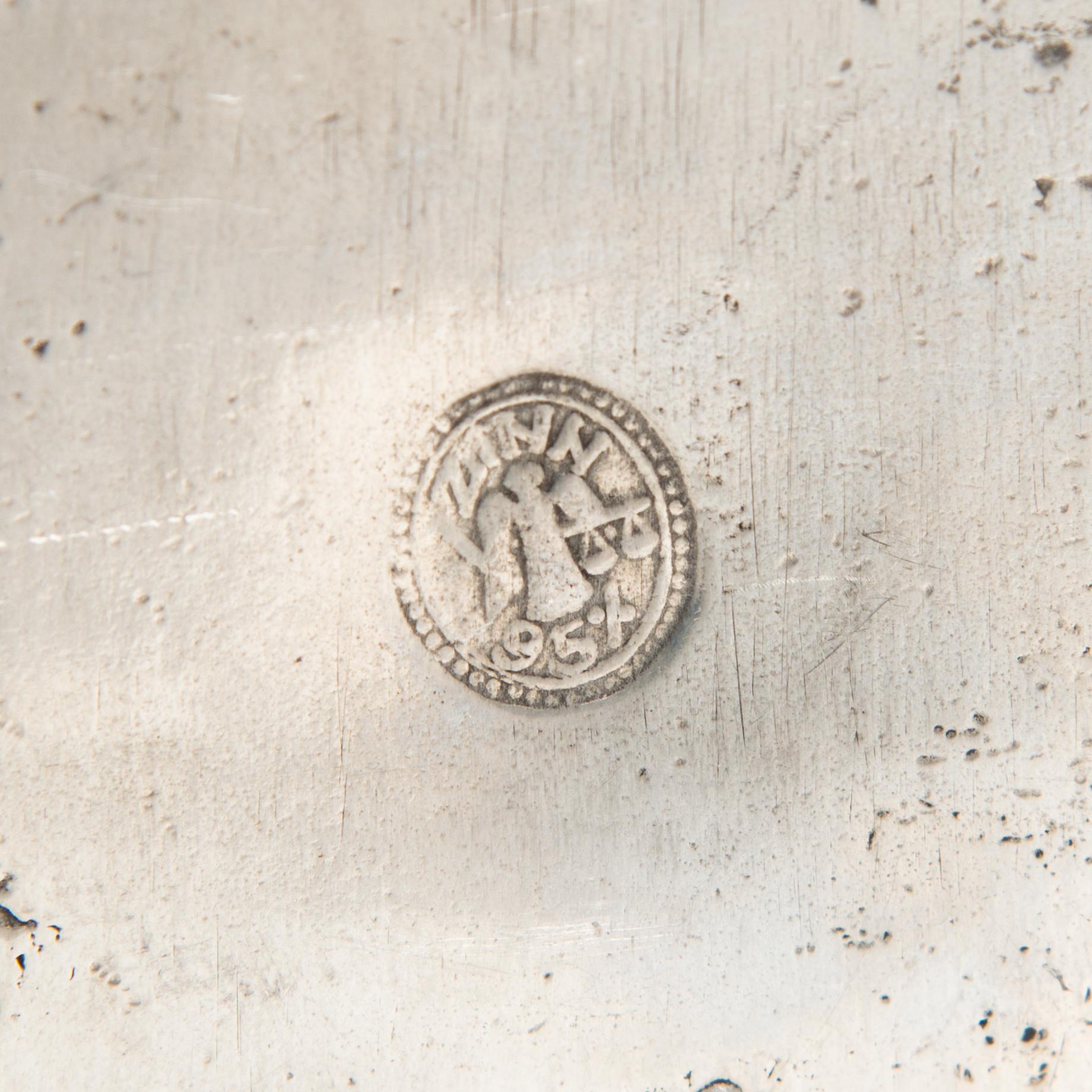 A pair of 1920s-30s tin sconces.