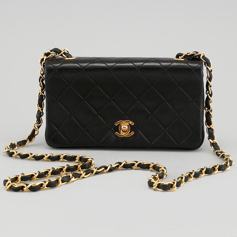 A 'Mini Flap' Chanel lamb skin handbag.