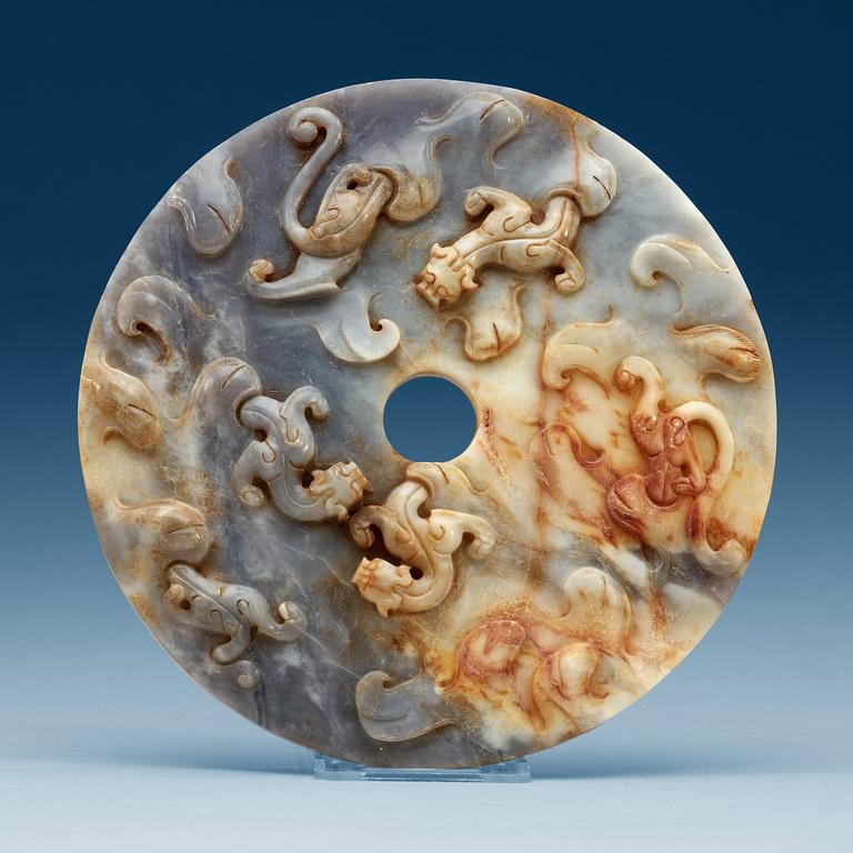 A Chinese archaistic style carved Bi disc.