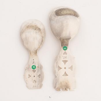 Two reindeer horn spoons by Nikolaus Fankki.