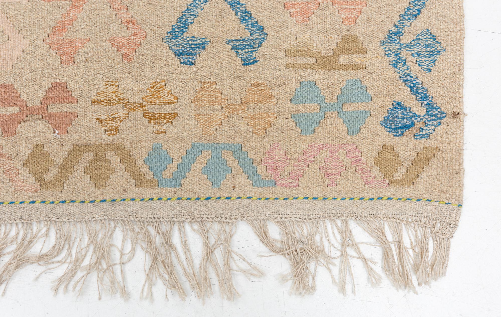 A Kelim carpet, c. 252 x 200 cm.