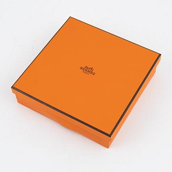 Hermès, an orange Clemence 'Mises et Relances' change tray, 2012.