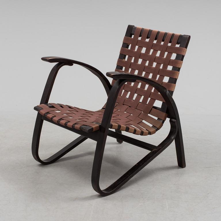 A 1930s easy chair by Jan Vanek.