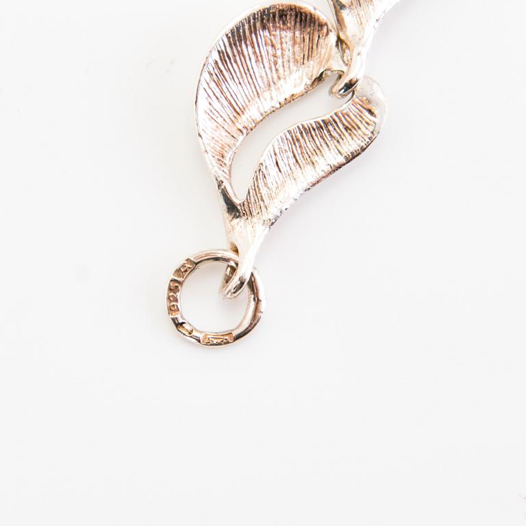 A set of sterling silver necklace and bracelet. Valo-koru, Turku.