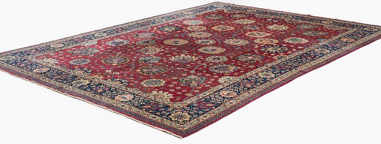 A fine Meshed carpet of 'Vase' design, North-East Persia, c. 480 x 345 cm.
