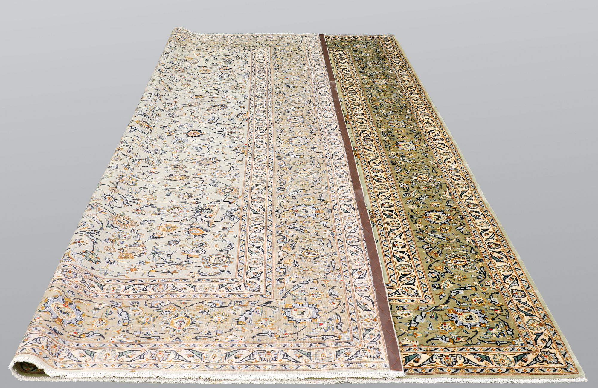 A carpet, Kashan, ca 396 x 314 cm.