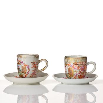 A pair of famille rose cups with saucers, Qing dynasty, Qianlong (1736-95).