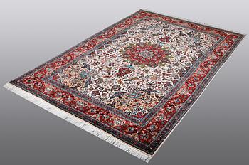 A RUG, Tabriz  part silk, ca 317 x 200 cm.