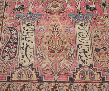 A CARPET, an antique Kerman Laver, ca 363 x 301 cm.