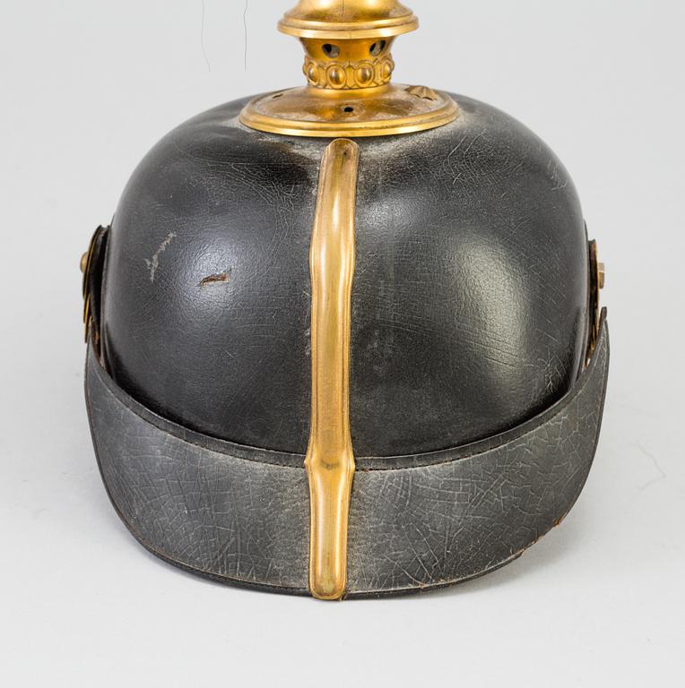 A Swedish military 
officer helmet m/1894.