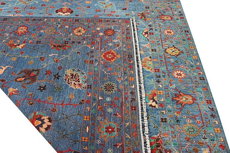 A Khorjin carpet with a Ziegler pattern, c. 307 x 252 cm.