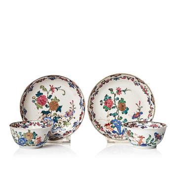 A pair of famille rose cups with stands, Qing dynasty, Qianlong (1736-95).