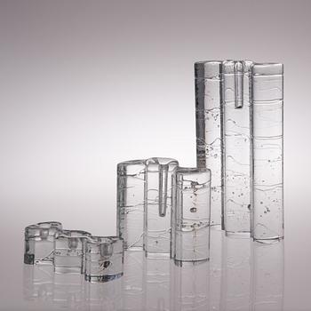 A glass sculpture / a set of three candlesticks, the Archipelago series. Signed Timo Sarpaneva.