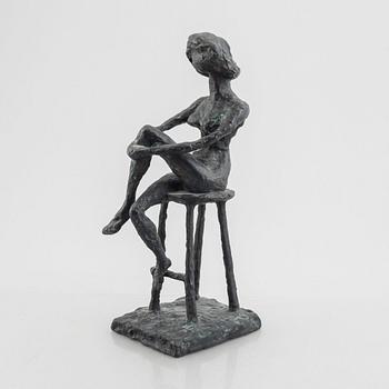 Inga Bagge, A seated woman.