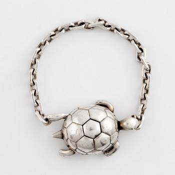 Hermès, silver turtle key charm.