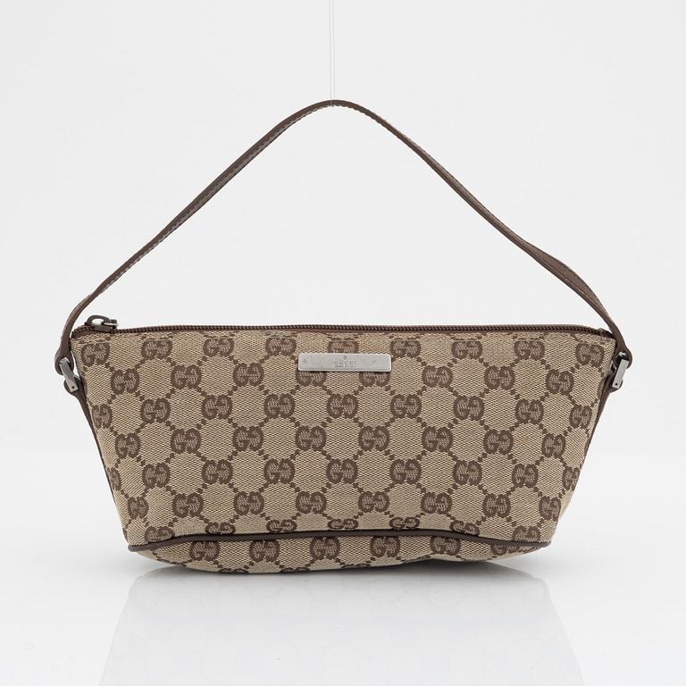 Gucci, a monogram canvas bag.