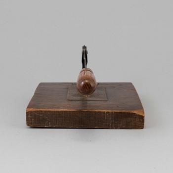 A 19TH CENTURY TOBACCO CUTTER, wood and iron.