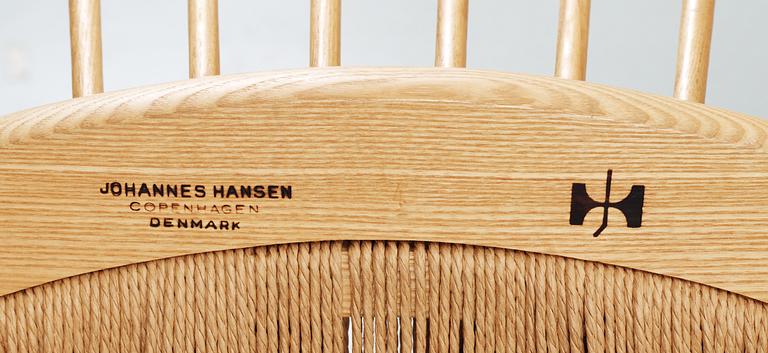 A Hans J Wegner ash and teak 'Peacock chair', Johannes Hansen, Denmark.