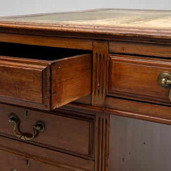 A 20th century writing desk, England.