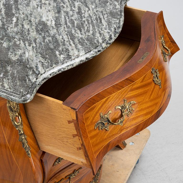 A rococo-style chest of drawers, early 20th century.
