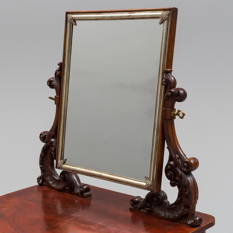A mid 19th century late empire dressing table.