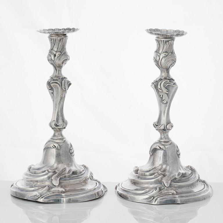 Four Swedish Rococo silver candlesticks, mark of Arvid Floberg, Stockholm 1768 and 1779.