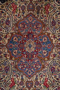 Matto, a semi-antique silk Kashan, ca 212,5-214,5 x 134,5-135,5 cm.