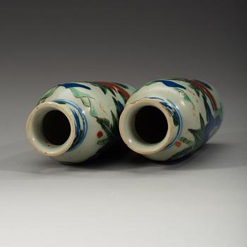 A pair of wucai transition vases, 17th Century.