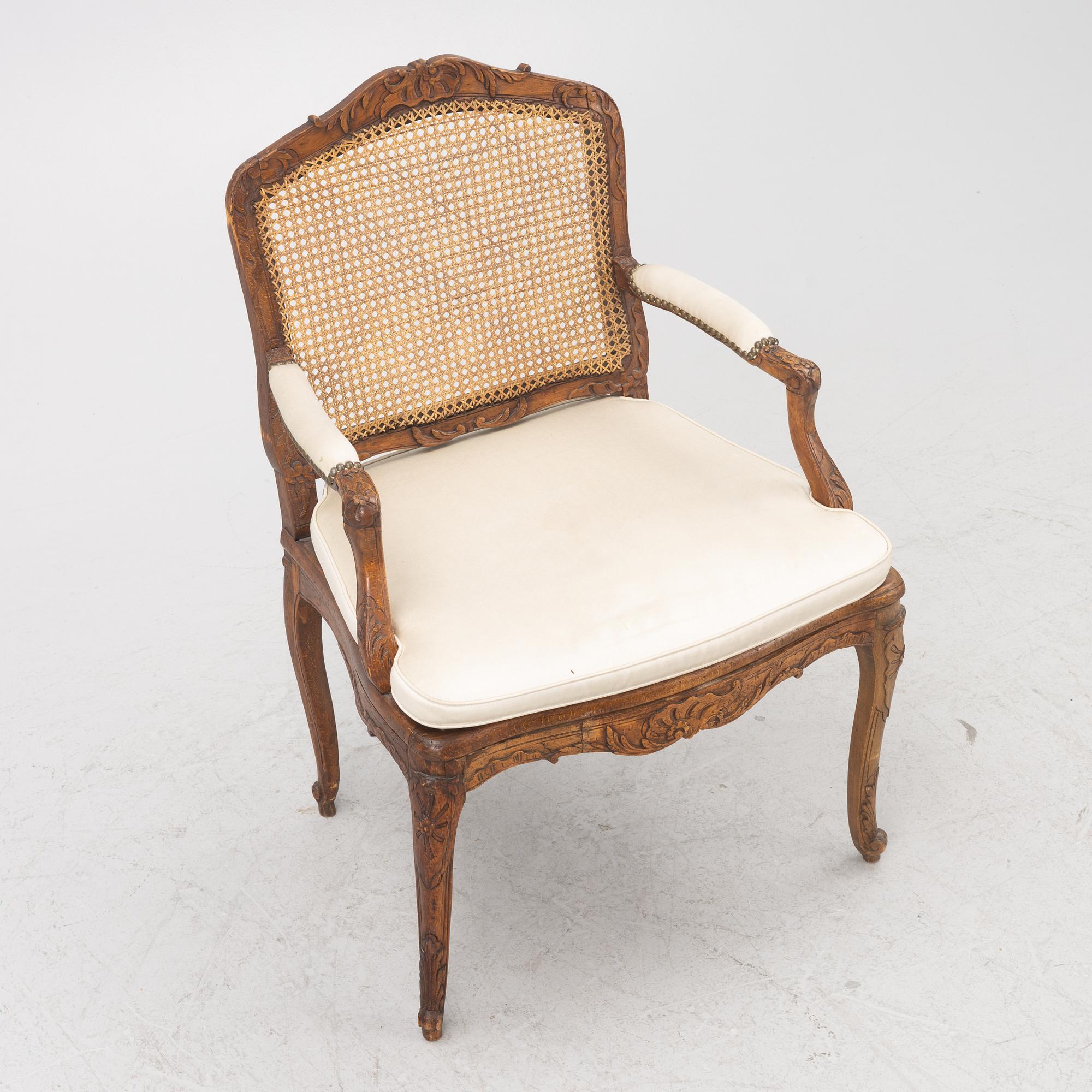 A French Louis XV armchair, mid 18th century.