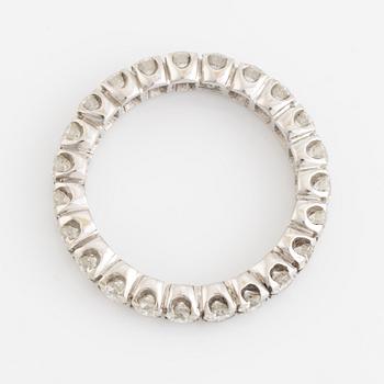 Brilliant cut diamond eternity ring.