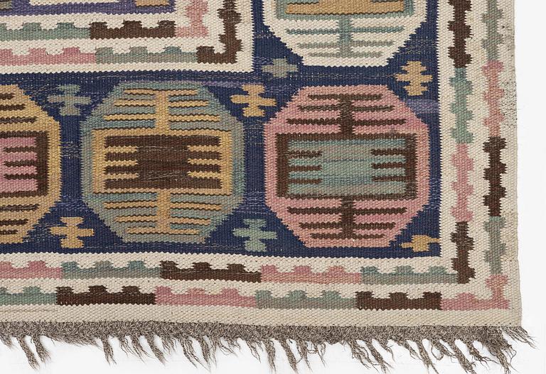 Märta Måås-Fjetterström, a carpet, 'Dukater', flat weave, c. 315 x 250 cm, signed AB MMF.