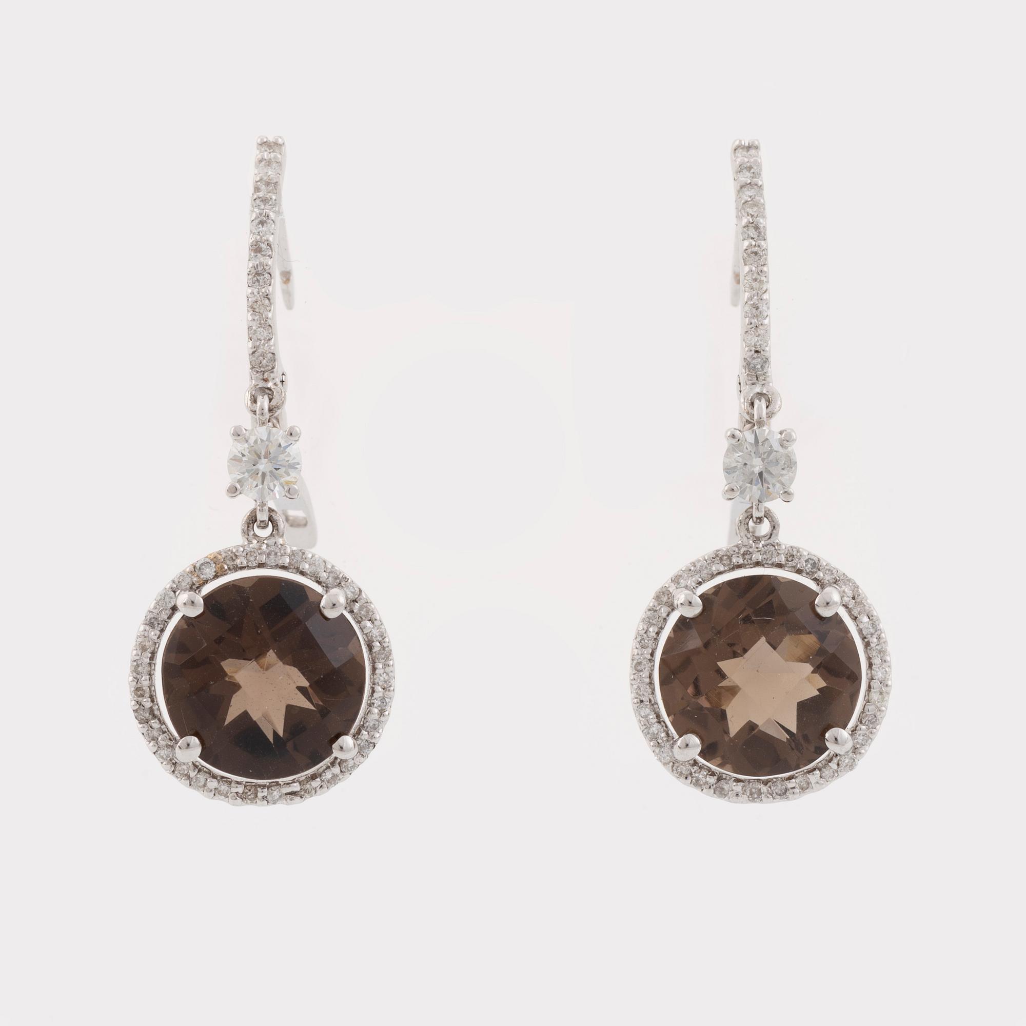 Smoky quartz and brilliant cut diamond earrings.