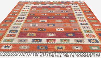 Märta Måås-Fjetterström, a carpet, 'Röd grön äng', flat weave, c. 345 x 251 cm, signed AB MMF.