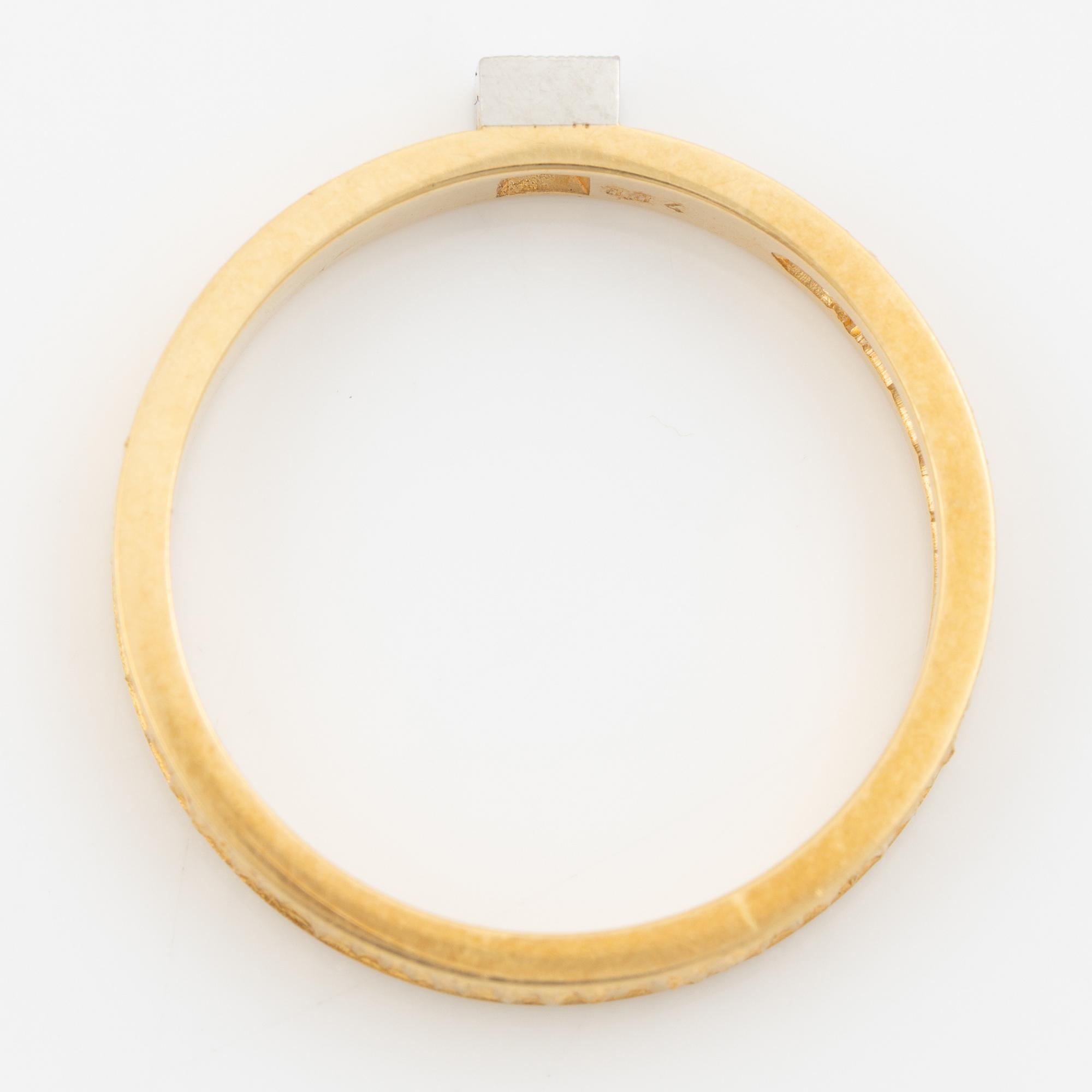Lapponia, ring, 18K gold set with a round brilliant-cut diamond, Finland 1977.