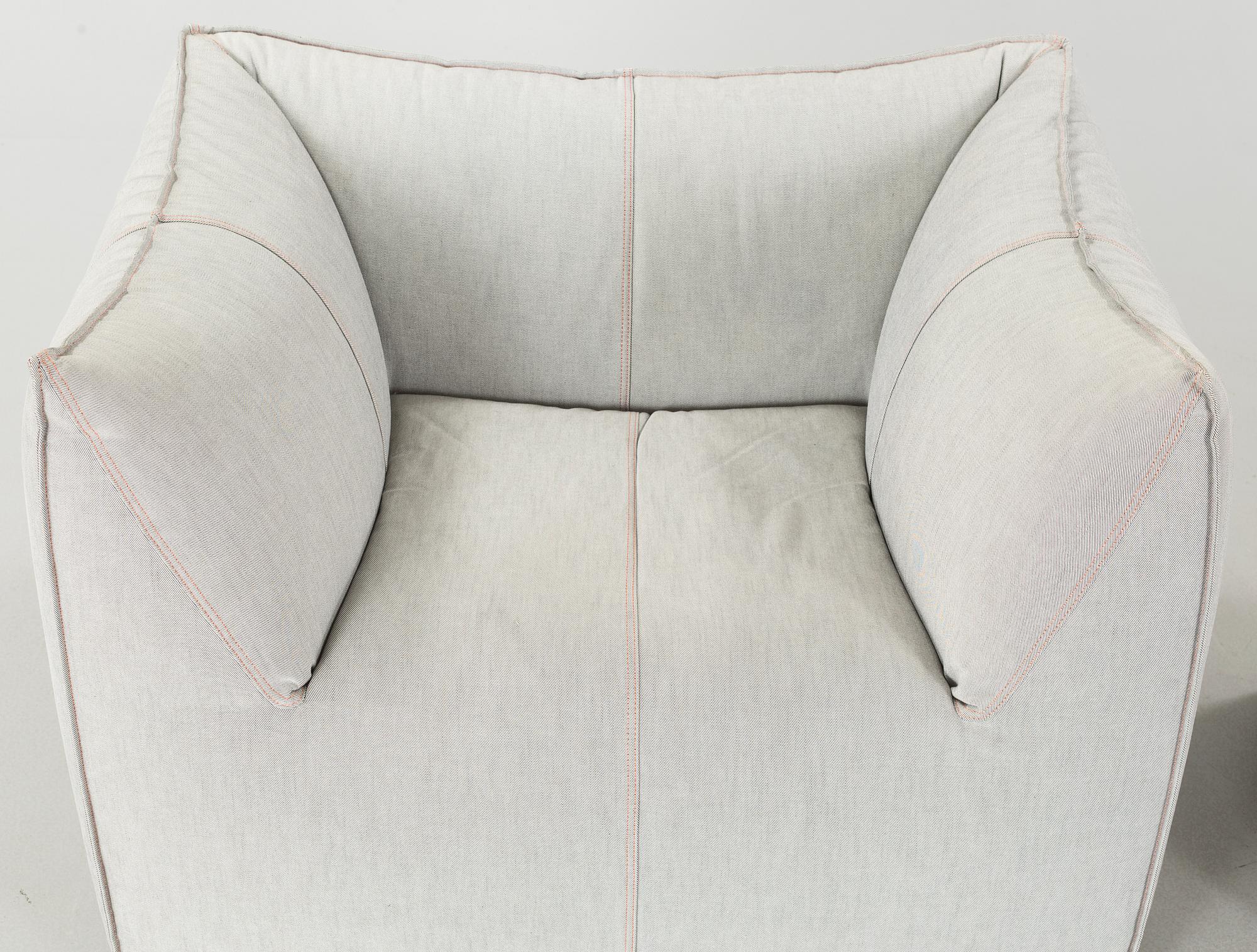 A "Le Bambole '07" armchair and a "Bambouff" footstool, designed by Mario Bellini, 21st century.