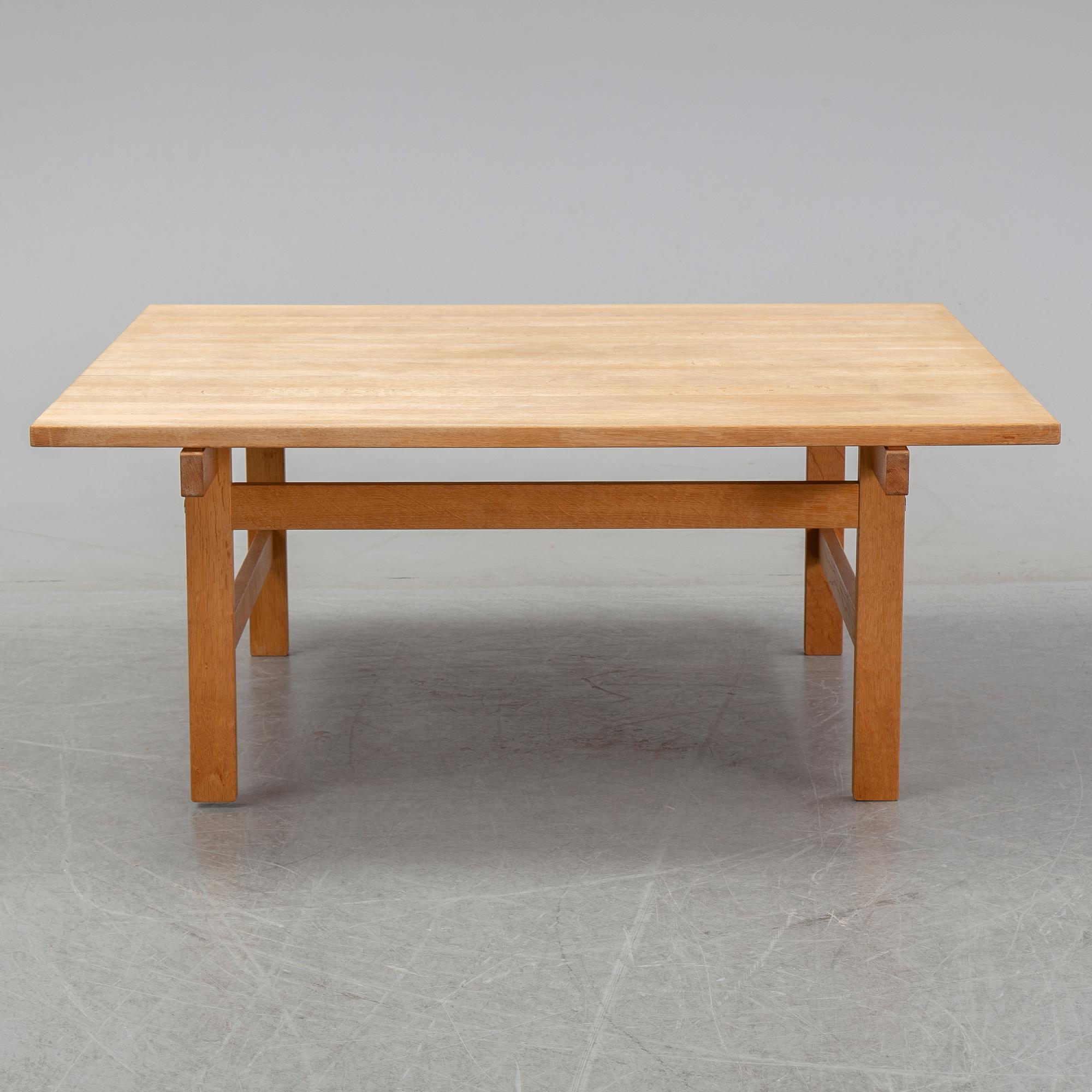 An oak coffee table by Hans J Wegner for Andreas Tuck, Denmark.