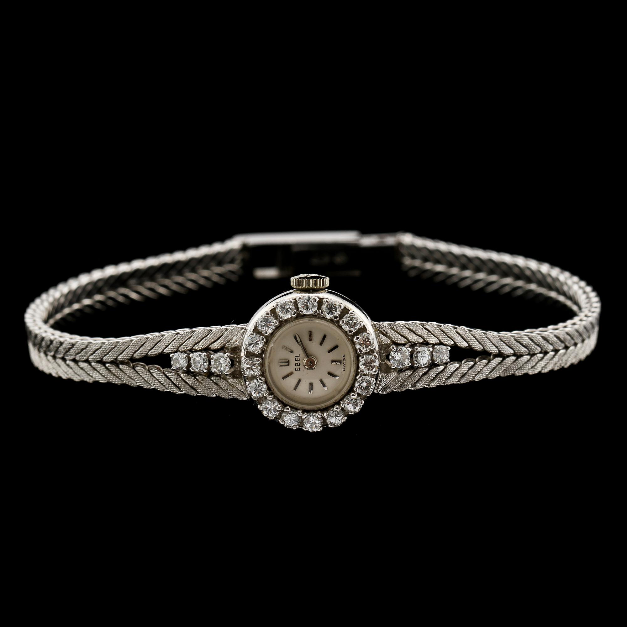 DAMARMBANDSUR, 18k vitguld med 22 briljantslipade diamanter, tot ca 0.66 ct, Ebel, Schweiz, 1900-tal. Vikt 24 g.