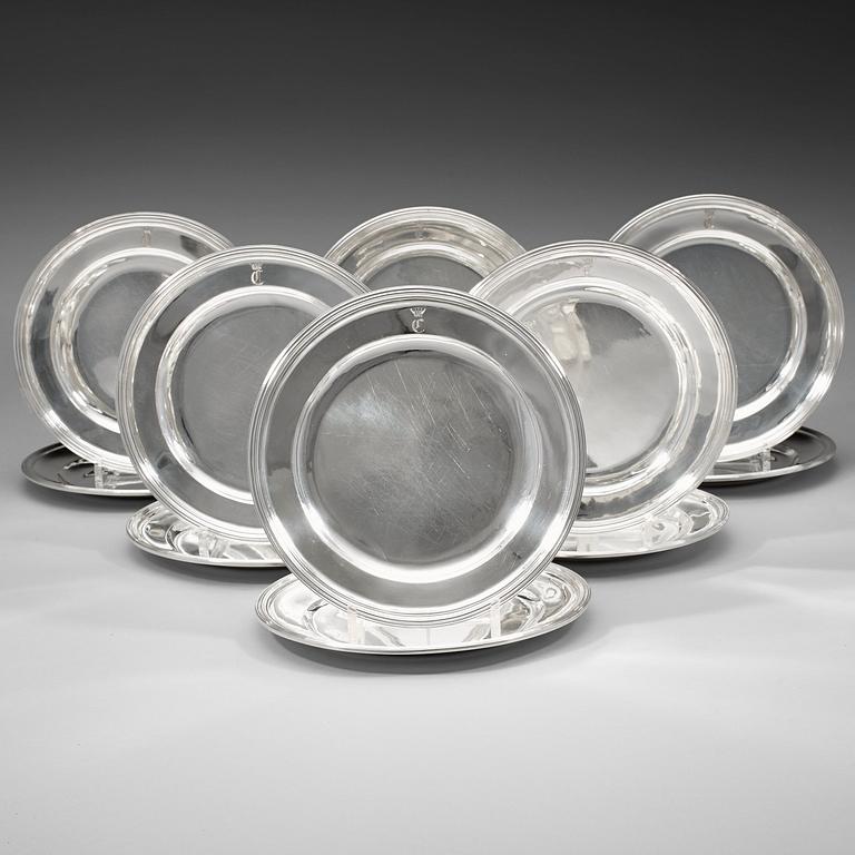 A set of 12 Swedish 19th century silver plates, Christian Hammer and Gustaf Möllenborg, Stockholm 1864-1875 (9+3).