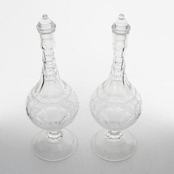 Edward Hald, a pair of "Molnet" decanters with stoppers, Orrefors, Sweden.