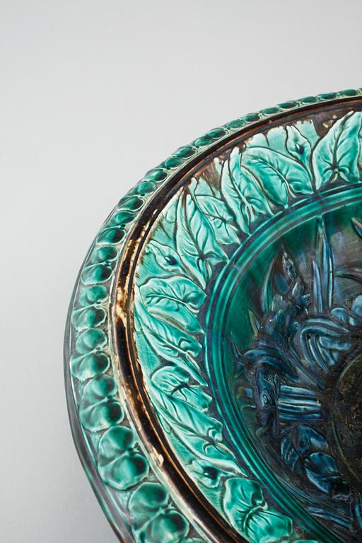 A majolica bowl by Rörstrand, dated 1872.