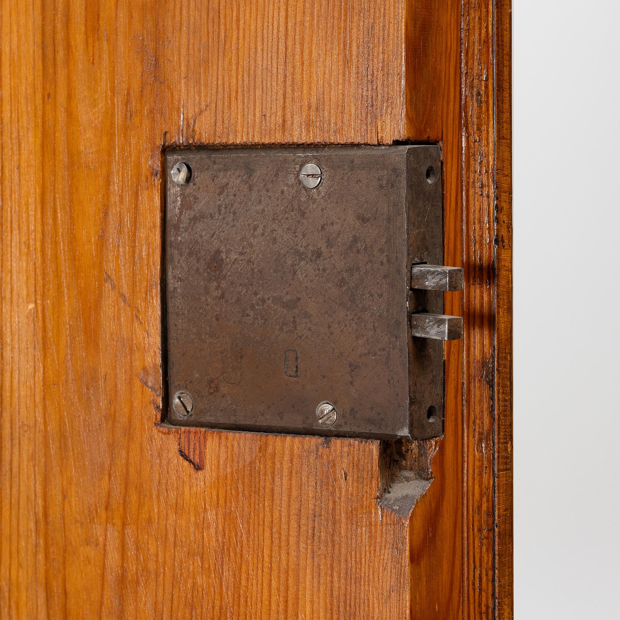 A Swedish rococo burr-alder veneered cabinet, later part 18th century.