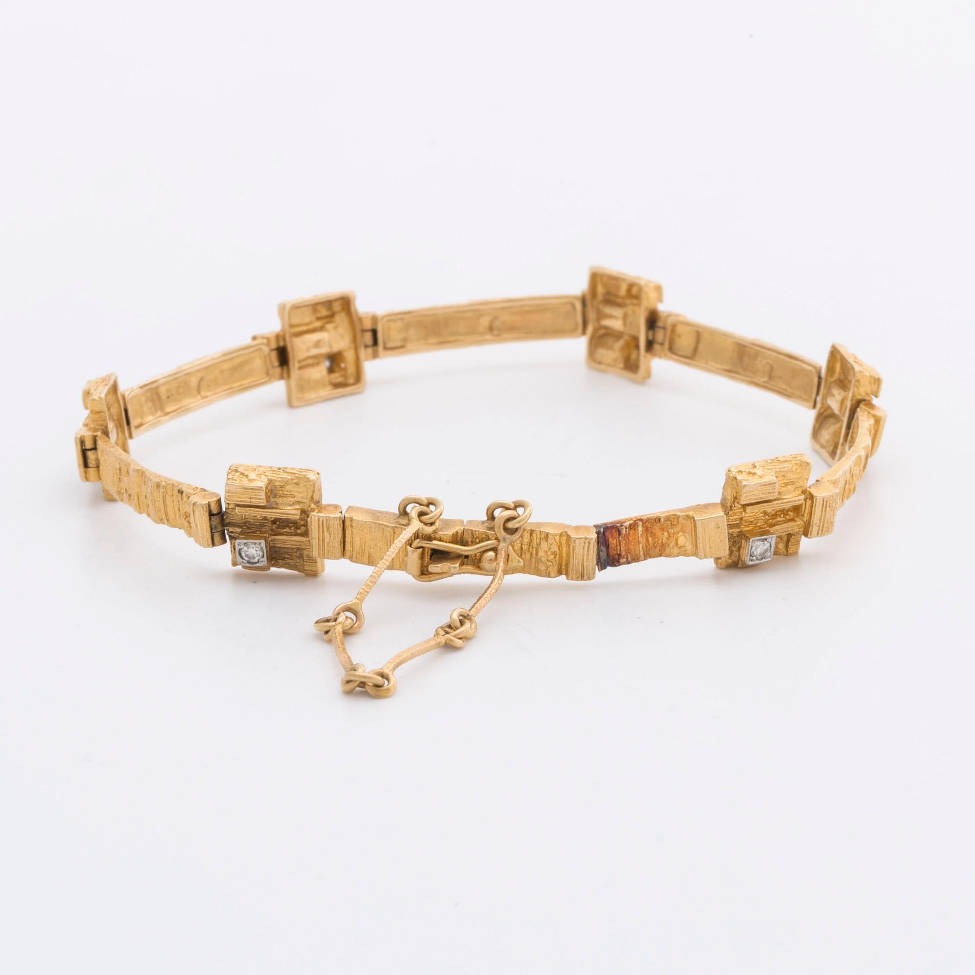 LAPPONIA ARMBAND 18K guld m 6 diamanter 8/8 0,12 ct totalt enligt gravyr, Finland 1976.
