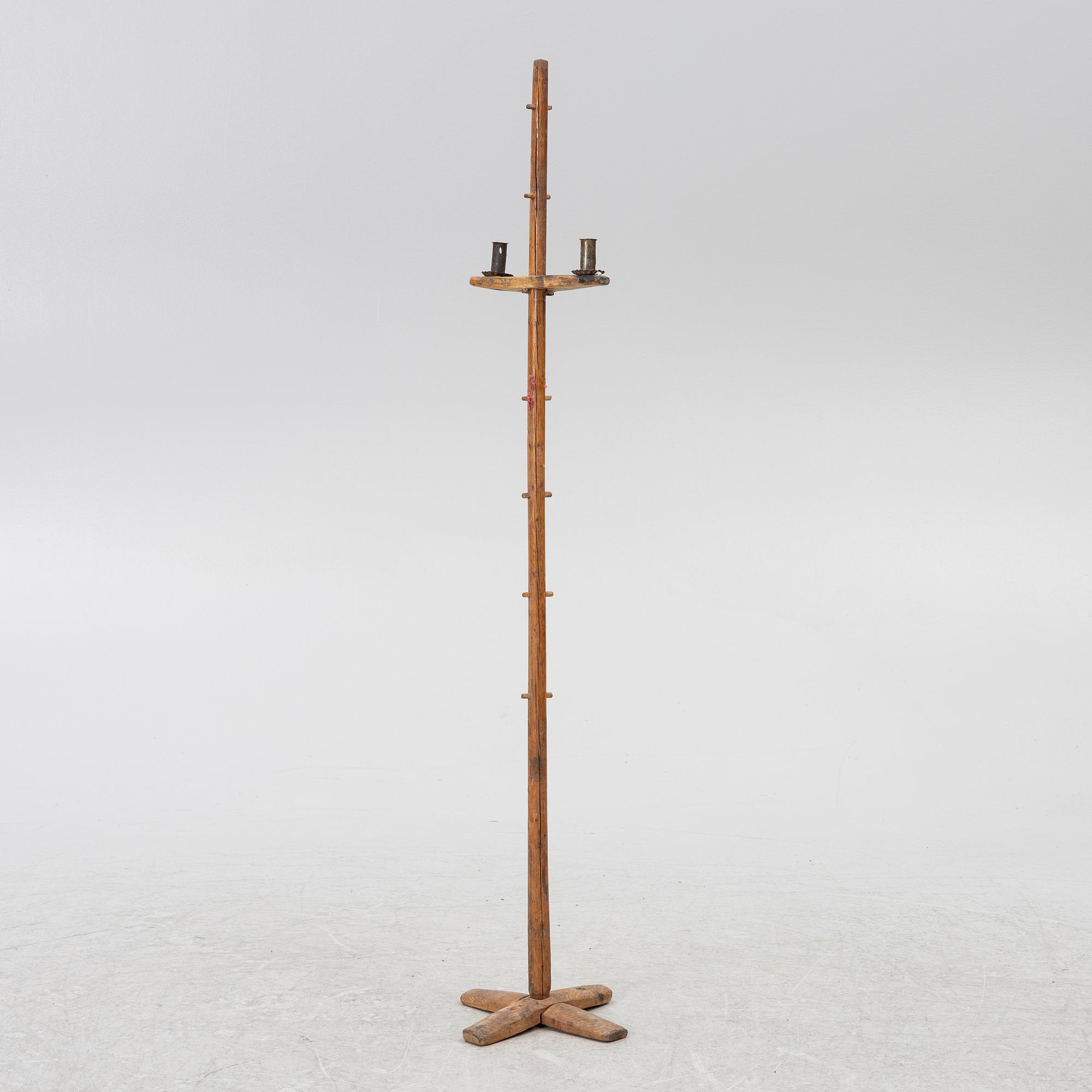 A floor candlestick, 19th Century.