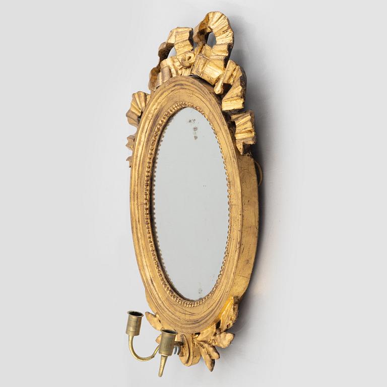 A Gustavian mirror wall sconce, late 18th Century.