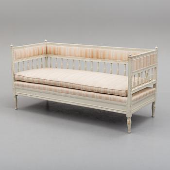An early 19th century painted late Gustavian sofa.