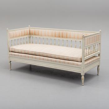 An early 19th century painted late Gustavian sofa.