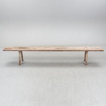 A pine bench, 19th Century.